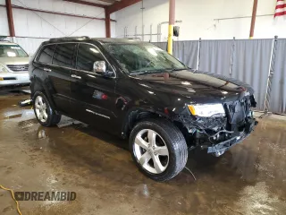 2015 Jeep Grand Cherokee Limited with VIN 1C4RJFBGXFC226717, listed as a Copart auction lot 53698355 with 104,200 mi miles and Salvage Title. Bid and sale history available at carsss.com. Image 4.