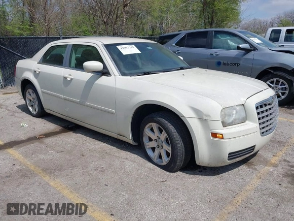 2006 Chrysler 300 with VIN 2C3LA43R16H250237, listed as a IAAI auction lot 42002745 with 157,911 mi miles. Bid and sale history available at carsss.com. Image 1.