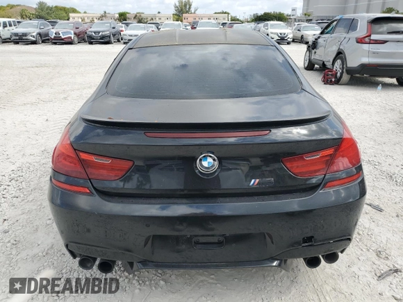 2014 BMW M6 z VIN WBSLX9C59ED160536, wystawiony jako Copart lot #55142095 z przebiegiem 78 550 mil mil oraz Tytuł czysty. Historia ofert i sprzedaży dostępna na DreamBid. Obrazek 6.