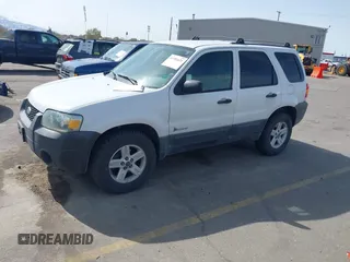 2006 Ford Escape Hybrid with VIN 1FMYU96H96KD56271, listed as a IAAI auction lot 41981621 with 156,825 mi miles and . Bid and sale history available at DreamBid. Image 2.