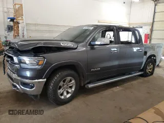 2021 Ram 1500 Laramie z VIN 1C6SRFJT0MN784447, wystawiony jako Copart lot #55735825 z przebiegiem Nie podano mil oraz Szkoda całkowita • Salvage title. Historia ofert i sprzedaży dostępna na DreamBid. Obrazek 1.