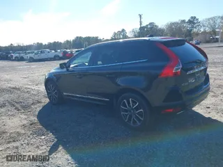 2016 Volvo XC60 T6 Drive-E with VIN YV449MDK0G2825672, listed as a IAAI auction lot 41351214 with 140,633 mi miles. Bid and sale history available at carsss.com. Image 3.