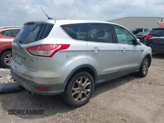 2013 Ford Escape SEL with VIN 1FMCU9H95DUA48886, listed as a IAAI auction lot 42117937 with 244,101 mi miles. Bid and sale history available at carsss.com. Image 4.