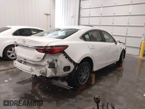 2018 Mazda Mazda6 Touring with VIN JM1GL1VM2J1324151, listed as a IAAI auction lot 41798049 with 37,415 mi miles. Bid and sale history available at carsss.com. Image 4.
