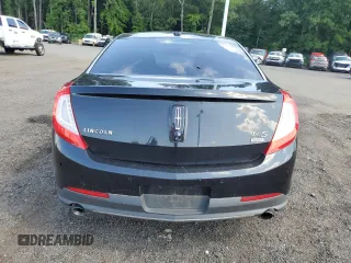 2013 Lincoln MKS z VIN 1LNHL9EK2DG615733, wystawiony jako Copart lot #68223794 z przebiegiem 402 495 mil mil oraz Szkoda całkowita • Salvage title. Historia ofert i sprzedaży dostępna na DreamBid. Obrazek 6.
