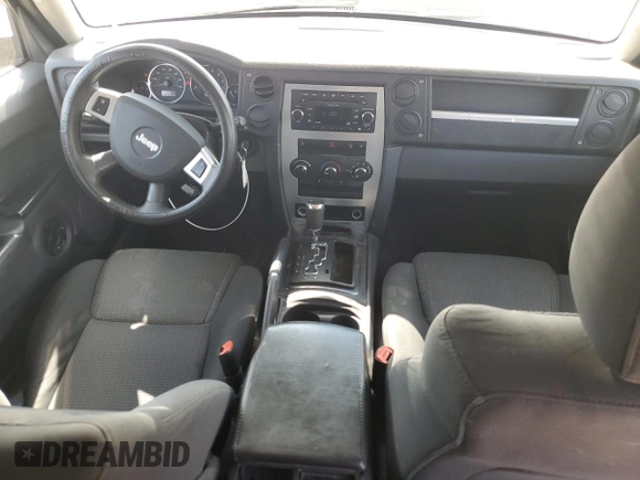 2009 Jeep Commander Sport z VIN 1J8HH48K79C501349, wystawiony jako Copart lot #62368885 z przebiegiem 191 923 mil mil oraz Szkoda całkowita • Salvage title. Historia ofert i sprzedaży dostępna na DreamBid. Obrazek 8.