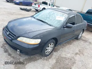 2002 Honda Accord SE z VIN 1HGCG668X2A171099, wystawiony jako IAAI lot #42081358 z przebiegiem 215 915 mil mil oraz . Historia ofert i sprzedaży dostępna na DreamBid. Obrazek 2.