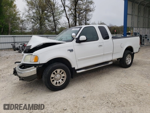 2002 Ford F-150 XL with VIN 1FTRX18L42NB60380, listed as a Copart auction lot 51806955 with 293,591 mi miles and Salvage title. Bid and sale history available at DreamBid. Image 1.