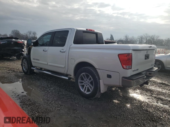 2014 Nissan Titan S with VIN 1N6AA0EC7EN503648, listed as a Copart auction lot 86517824 with 82,556 mi miles and Salvage Title. Bid and sale history available at DreamBid. Image 2.