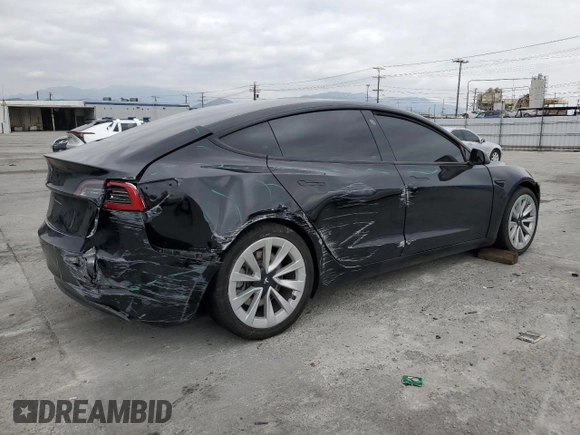 2022 Tesla Model 3 with VIN 5YJ3E1EA3NF190102, listed as a Copart auction lot 50657535 with 73,015 mi miles and Salvage Title. Bid and sale history available at DreamBid. Image 3.