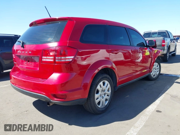 2015 Dodge Journey SE z VIN 3C4PDCAB9FT587668, wystawiony jako IAAI lot #41868556 z przebiegiem 99 695 mil mil oraz . Historia ofert i sprzedaży dostępna na DreamBid. Obrazek 4.