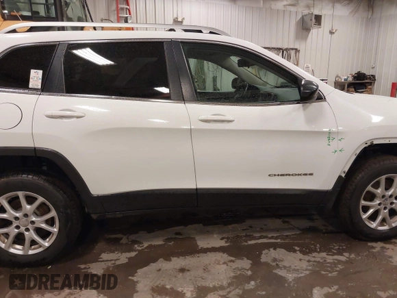 2014 Jeep Cherokee Latitude with VIN 1C4PJMCS4EW318353, listed as a IAAI auction lot 41945598 with 179,425 mi miles and . Bid and sale history available at DreamBid. Image 13.