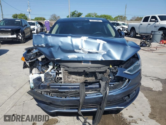 2018 Ford Fusion SE z VIN 3FA6P0HD7JR180095, wystawiony jako Copart lot #55980745 z przebiegiem 76 994 mil mil oraz Czysty tytuł • Clean title. Historia ofert i sprzedaży dostępna na DreamBid. Obrazek 5.