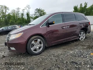 2011 Honda Odyssey Touring with VIN 5FNRL5H95BB052274, listed as a Copart auction lot 55680925 with 195,611 mi miles and Salvage title. Bid and sale history available at DreamBid. Image 1.
