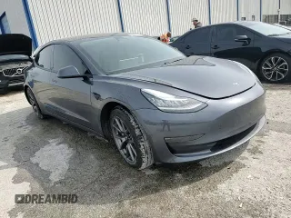 2022 Tesla Model 3 Long Range z VIN 5YJ3E1EB7NF238905, wystawiony jako Copart lot #53362045 z przebiegiem 52 002 mil mil oraz Szkoda całkowita • Salvage title. Historia ofert i sprzedaży dostępna na DreamBid. Obrazek 13.