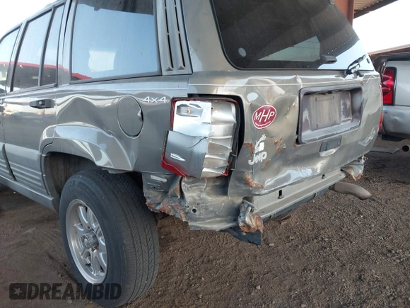1998 Jeep Grand Cherokee Laredo with VIN 1J4GZ58S9WC136684, listed as a IAAI auction lot 41444103 with 1 mi miles. Bid and sale history available at carsss.com. Image 6.