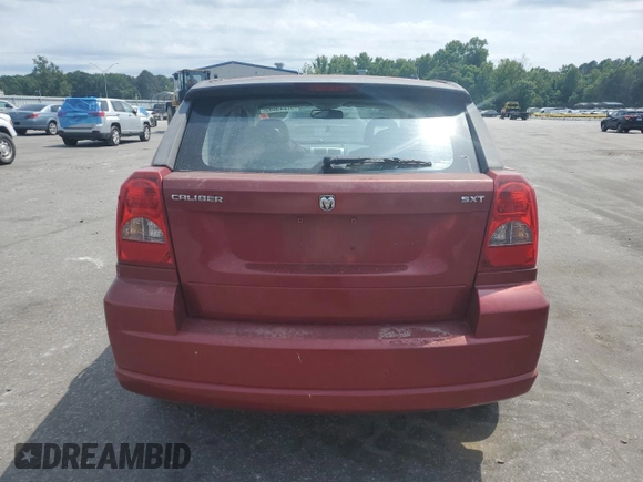 2007 Dodge Caliber SXT z VIN 1B3HB48B97D202527, wystawiony jako Copart lot #57245085 z przebiegiem 133 366 mil mil oraz Szkoda całkowita • Salvage title. Historia ofert i sprzedaży dostępna na DreamBid. Obrazek 6.