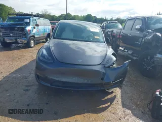 2023 Tesla Model Y Long Range with VIN 7SAYGDEE2PF674286, listed as a IAAI auction lot 42010275 with Not Provided miles and . Bid and sale history available at carsss.com. Image 12.