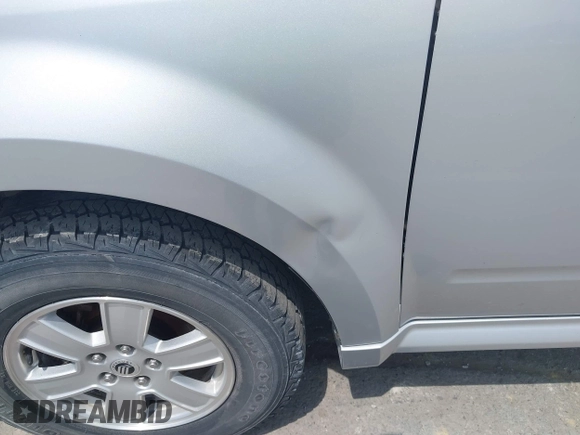 2010 Mercury Mariner with VIN 4M2CN8B77AKJ29263, listed as a IAAI auction lot 42865830 with 138,528 mi miles and . Bid and sale history available at DreamBid. Image 6.