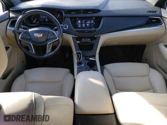 2018 Cadillac XT5 FWD with VIN 1GYKNARS2JZ241702, listed as a Copart auction lot 84031294 with 67,866 mi miles and Salvage title. Bid and sale history available at DreamBid. Image 8.