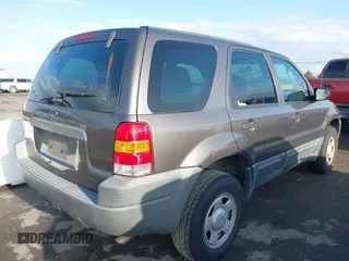 2004 Ford Escape with VIN 1FMCU02174KA61956, listed as a IAAI auction lot 41913605 with 166,587 mi miles and . Bid and sale history available at DreamBid. Image 4.