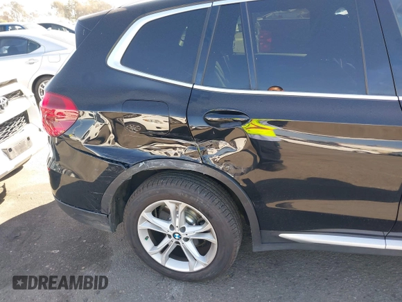 2019 BMW X3 sDrive30i with VIN 5UXTR7C5XKLR51471, listed as a IAAI auction lot 41718818 with 52,670 mi miles. Bid and sale history available at carsss.com. Image 6.