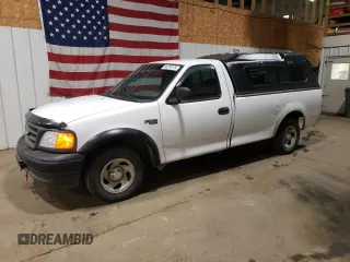 2004 Ford F-150 XL with VIN 2FTRF17204CA13994, listed as a Copart auction lot 64214175 with 148,291 mi miles and Salvage title. Bid and sale history available at DreamBid. Image 1.