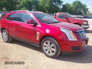 2015 Cadillac SRX Luxury Collection z VIN 3GYFNEE35FS617806, wystawiony jako IAAI lot #42032920 z przebiegiem 131 215 mil mil oraz . Historia ofert i sprzedaży dostępna na DreamBid. Obrazek 1.