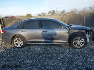 2020 Volkswagen Passat 2.0T S with VIN 1VWAA7A3XLC014300, listed as a IAAI auction lot 41431010 with 145,842 mi miles. Bid and sale history available at carsss.com. Image 14.