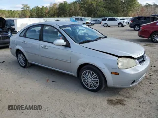 2006 Suzuki Forenza z VIN KL5JD56Z66K299816, wystawiony jako Copart lot #81893914 z przebiegiem 156 416 mil mil oraz Szkoda całkowita • Salvage title. Historia ofert i sprzedaży dostępna na DreamBid. Obrazek 4.
