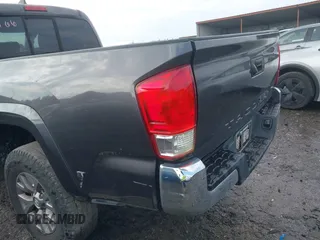 2016 Toyota Tacoma SR with VIN 5TFRX5GN6GX070766, listed as a IAAI auction lot 40461070 with 144,039 mi miles and . Bid and sale history available at DreamBid. Image 21.