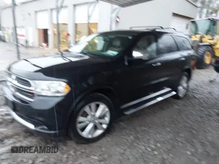 2013 Dodge Durango Crew with VIN 1C4SDJDT3DC509611, listed as a IAAI auction lot 41729805 with 161,357 mi miles. Bid and sale history available at carsss.com. Image 2.