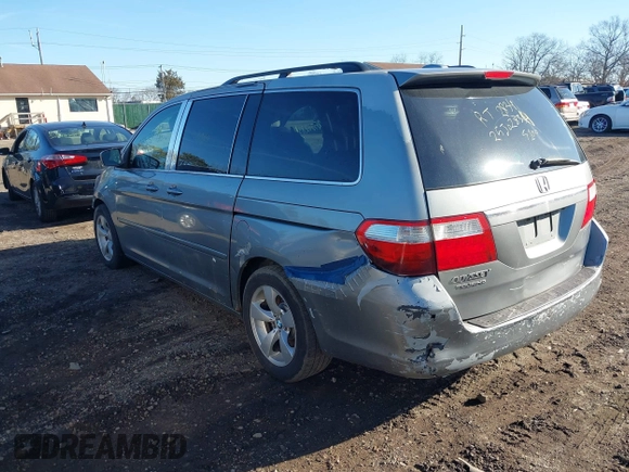 2006 Honda Odyssey TOURING with VIN 5FNRL38846B059685, listed as a IAAI auction lot 41831849 with 999,999 mi miles. Bid and sale history available at carsss.com. Image 3.