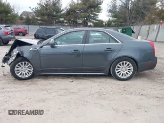 2012 Cadillac CTS Luxury z VIN 1G6DE5E51C0112608, wystawiony jako IAAI lot #41656992 z przebiegiem Nie podano mil oraz . Historia ofert i sprzedaży dostępna na DreamBid. Obrazek 14.
