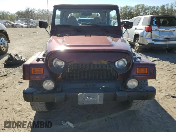2001 Jeep Wrangler Sahara with VIN 1J4FA59S61P335016, listed as a Copart auction lot 83019614 with 0 mi miles and Salvage Title. Bid and sale history available at carsss.com. Image 5.