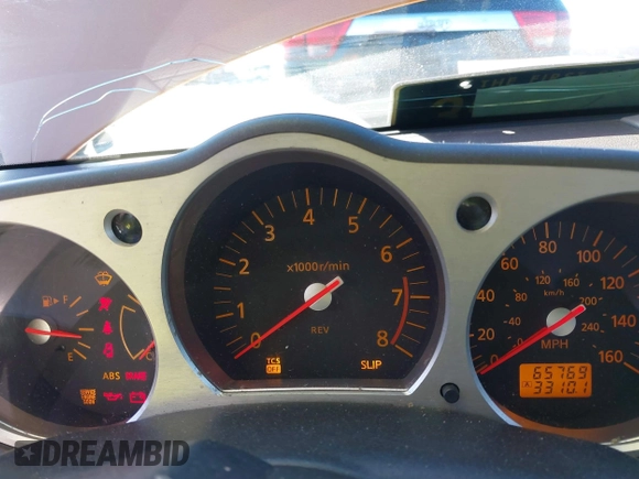 2004 Nissan 350Z Touring z VIN JN1AZ36A24T000472, wystawiony jako IAAI lot #38684053 z przebiegiem 65 769 mil mil oraz . Historia ofert i sprzedaży dostępna na DreamBid. Obrazek 7.
