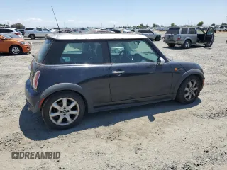 2006 MINI Hardtop with VIN WMWRC33516TK73752, listed as a Copart auction lot 62053245 with 126,836 mi miles and Clean title. Bid and sale history available at DreamBid. Image 3.