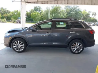 2014 Mazda CX-9 Grand Touring z VIN JM3TB2DA0E0434181, wystawiony jako IAAI lot #42295436 z przebiegiem 78 372 mil mil oraz . Historia ofert i sprzedaży dostępna na DreamBid. Obrazek 14.