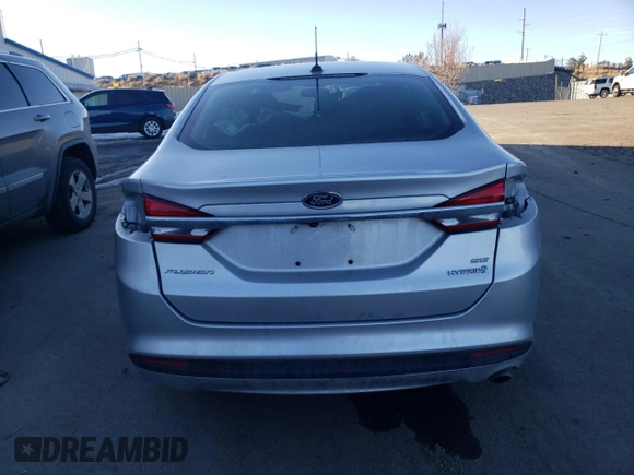 2018 Ford Fusion Hybrid SE with VIN 3FA6P0LU0JR235039, listed as a Copart auction lot 40103613 with 83,129 mi miles. Bid and sale history available at carsss.com. Image 6.