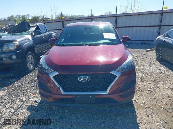 2019 Hyundai Tucson SE with VIN KM8J2CA41KU926156, listed as a IAAI auction lot 41888461 with 91,094 mi miles. Bid and sale history available at carsss.com. Image 12.
