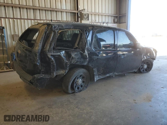 2013 Chevrolet Tahoe Commercial with VIN 1GNLC2E01DR190568, listed as a Copart auction lot 49525875 with 87,872 mi miles and Salvage title. Bid and sale history available at DreamBid. Image 3.