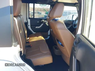 2013 Jeep Wrangler Unlimited Sahara with VIN 1C4BJWEG3DL658530, listed as a IAAI auction lot 41421006 with 115,321 mi miles and . Bid and sale history available at DreamBid. Image 8.