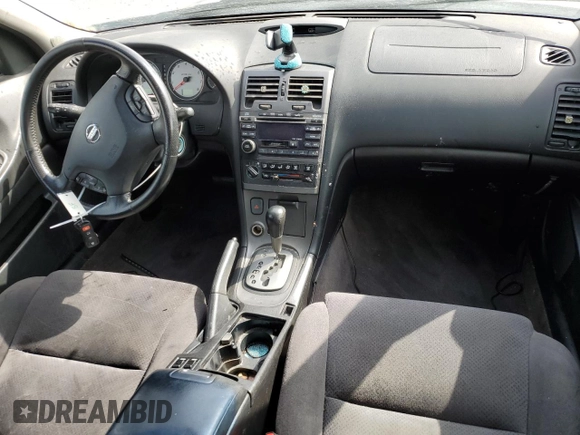 2002 Nissan Maxima GLE z VIN JN1DA31A52T301567, wystawiony jako Copart lot #51479115 z przebiegiem 122 327 mil mil oraz Szkoda całkowita • Salvage title. Historia ofert i sprzedaży dostępna na DreamBid. Obrazek 8.