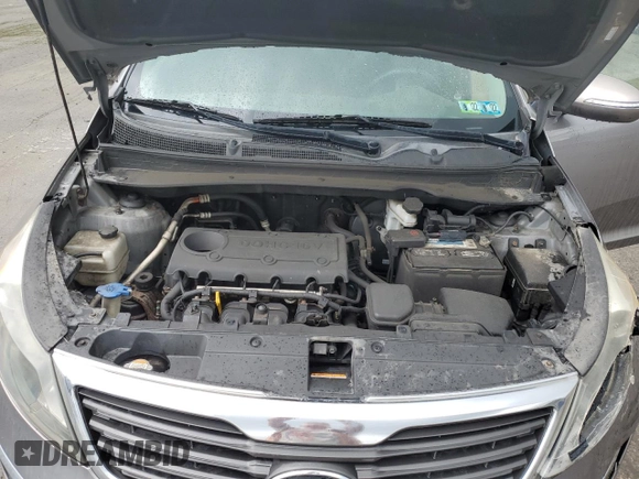 2012 Kia Sportage LX z VIN KNDPBCA24C7263100, wystawiony jako Copart lot #59538495 z przebiegiem 212 750 mil mil oraz Szkoda całkowita • Salvage title. Historia ofert i sprzedaży dostępna na DreamBid. Obrazek 12.