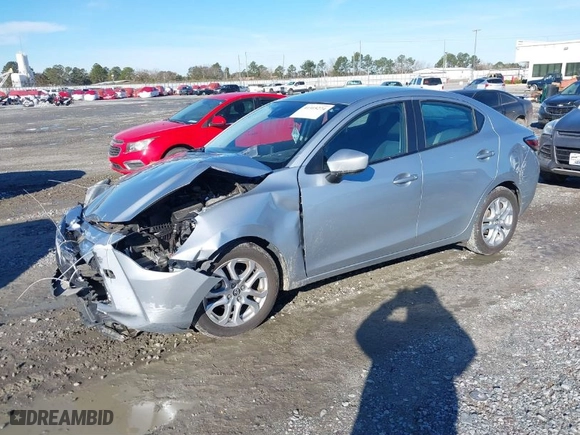 2017 Toyota Yaris iA with VIN 3MYDLBYV6HY183623, listed as a IAAI auction lot 41315274 with 65,635 mi miles. Bid and sale history available at carsss.com. Image 2.