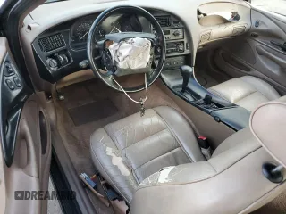 1994 Ford Thunderbird LX with VIN 1FALP62W6RH128762, listed as a Copart auction lot 84306604 with 68,314 mi miles and Salvage Title. Bid and sale history available at DreamBid. Image 8.