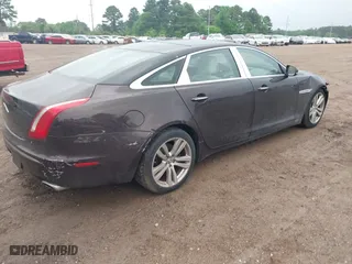 2011 Jaguar XJ with VIN SAJWA2GB9BLV12305, listed as a IAAI auction lot 41960231 with 105,742 mi miles. Bid and sale history available at carsss.com. Image 4.