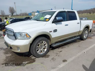 2014 Ram 1500 Longhorn Limited with VIN 1C6RR7PT9ES127063, listed as a IAAI auction lot 41817112 with 126,203 mi miles and . Bid and sale history available at DreamBid. Image 18.
