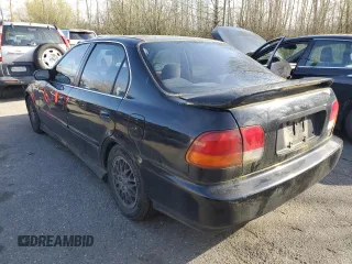 1998 Honda Civic EX with VIN 2HGEJ8643WH503510, listed as a Copart auction lot 50987235 with 247,265 mi miles and Salvage Title. Bid and sale history available at carsss.com. Image 2.