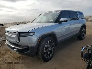 2025 Rivian R1S Adventure z VIN 7PDSGBBA8SN051315, wystawiony jako Copart lot #89384305 z przebiegiem 9151 mil mil oraz Szkoda całkowita • Salvage title. Historia ofert i sprzedaży dostępna na DreamBid. Obrazek 1.